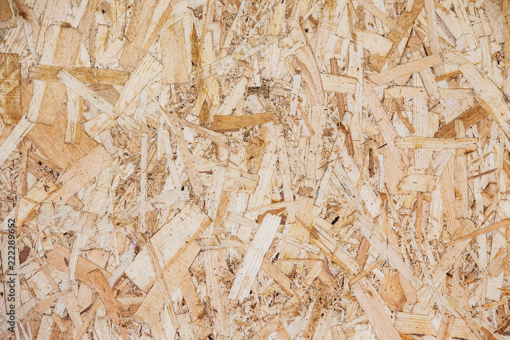 Wood particle board surface close-up background Wood particle board surface close-up background