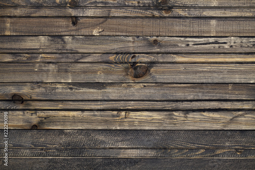 The old brown wood texture. Old grunge dark textured wooden background.