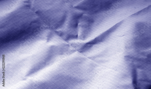 Сrumpled textile surface in blue tone.