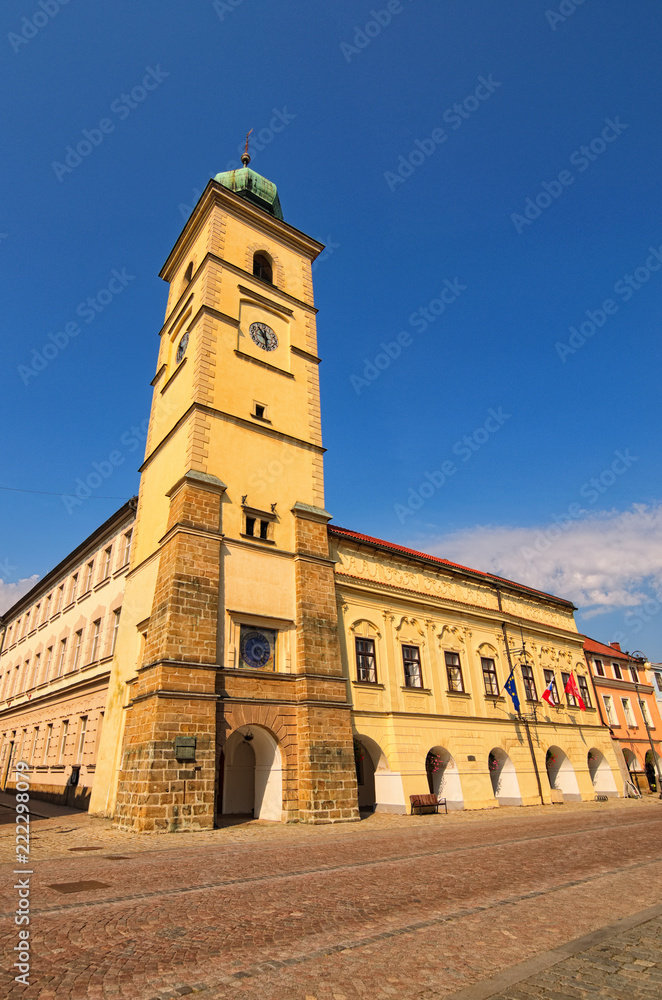 Colorful ancient Town hall against blue sky in summer day. Smetanovo square is main square in Litomysl, Czech Republic