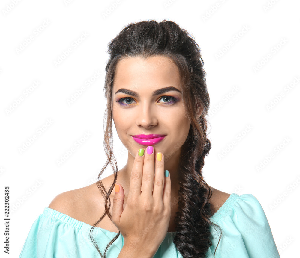 Beautiful young woman with colorful manicure on white background Beautiful young woman with colorful manicure on white background