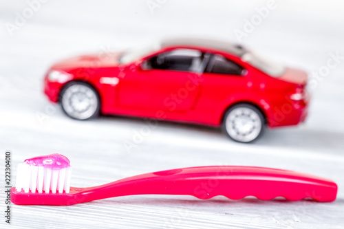 children s toothbrush oral care on wooden background