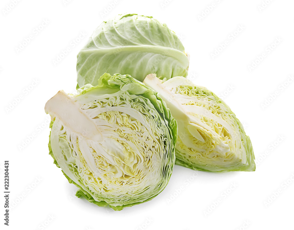 Fototapeta premium Whole and cut cabbages on white background