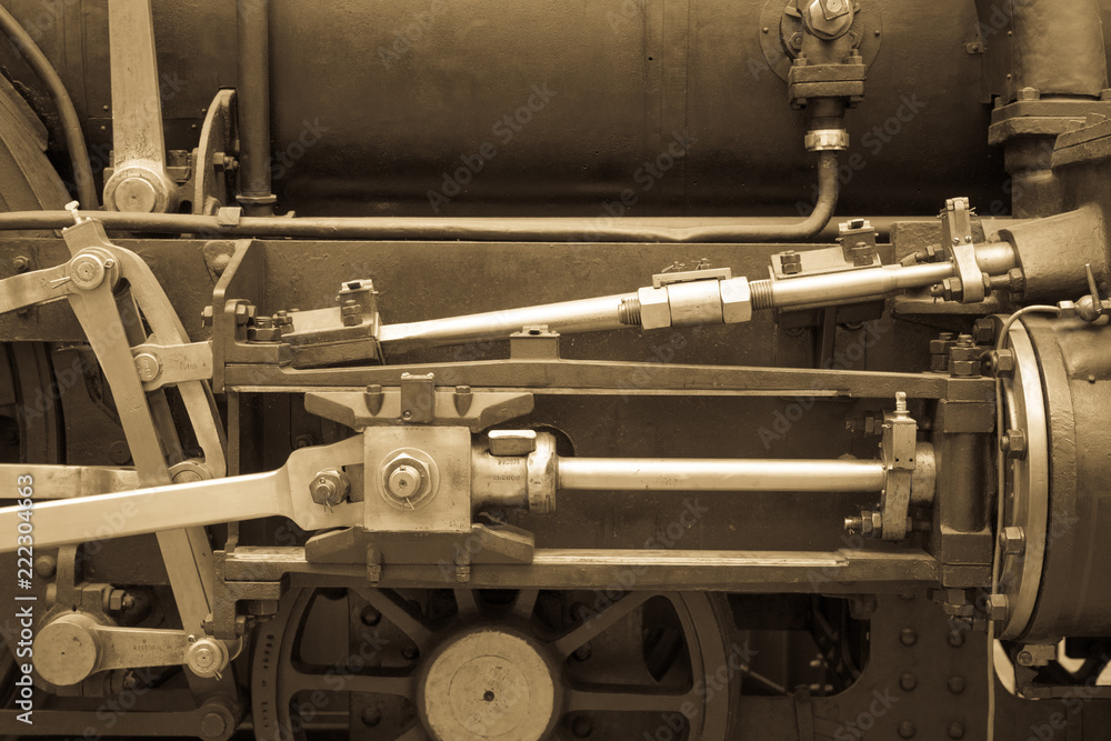 Old mechanism toned photo. Retro style machinery, gear, metal cogwheels, nuts and bolts. Old mechanism toned photo. Retro style machinery, gear, metal cogwheels, nuts and bolts.