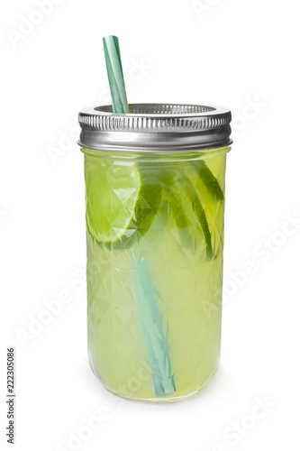 Jar of fresh lime lemonade on white background