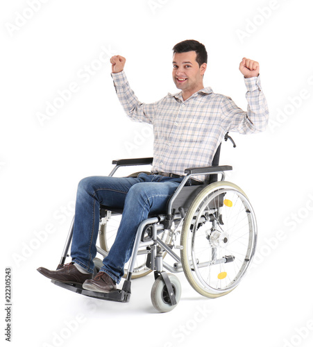 Happy man in wheelchair on white background