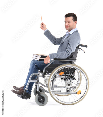 Male teacher in wheelchair ...
