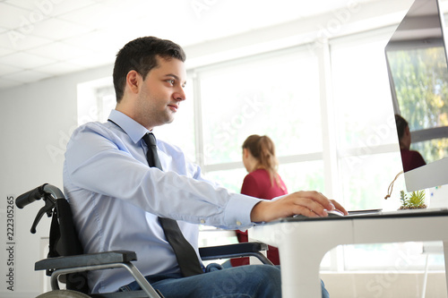 Businessman in wheelchair w...