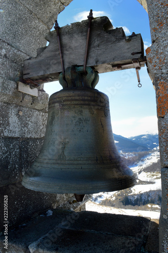 A old church bell, in the mountains.