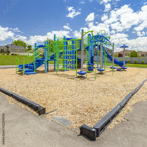 Canvas Print Colorful children playground with view of houses
