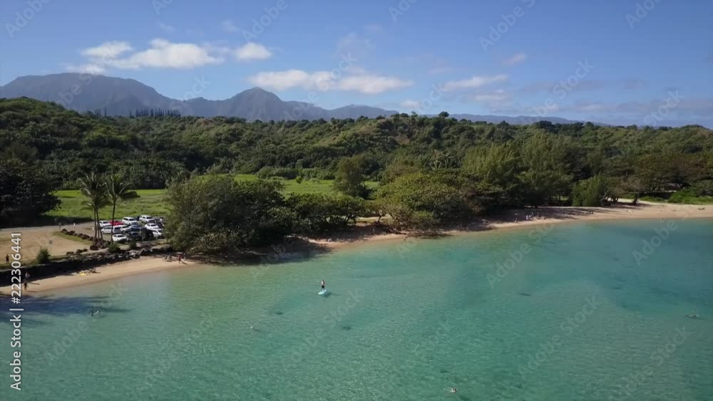 Aerial view over turquoise crystal clear tropical water. Calm sea behind reef Aerial view over turquoise crystal clear tropical water. Calm sea behind reef
