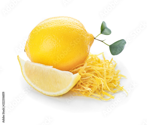 фотографія Ripe lemon with zest on white background