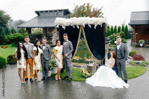 Fashionable wedding ceremony in autumn on a rainy day