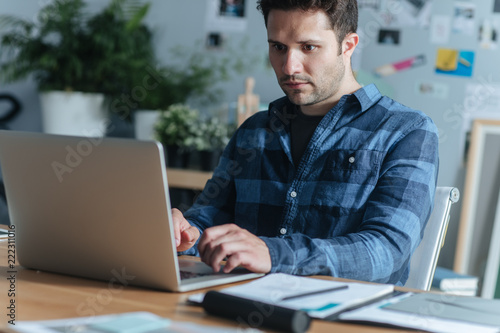 Businessman Working on a Laptop © LStockStudio