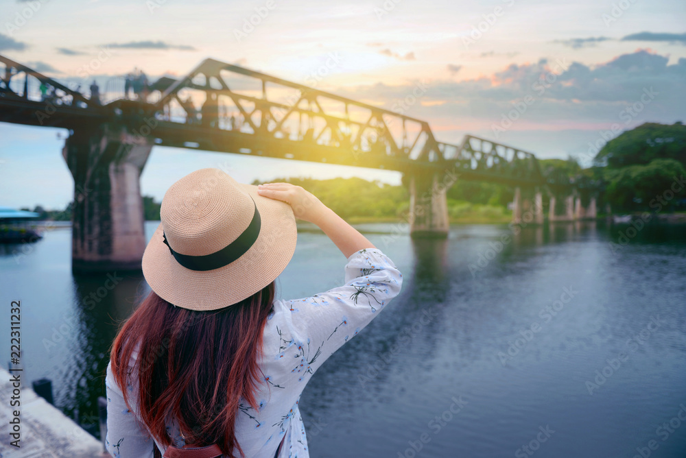 Fototapeta premium Woman is enjoy traveling relaxation in Kanchaburi, Thailand.
