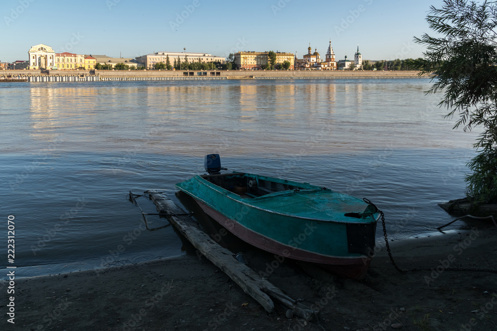 Fishing boat on the bank of the Angara in Irkutsk