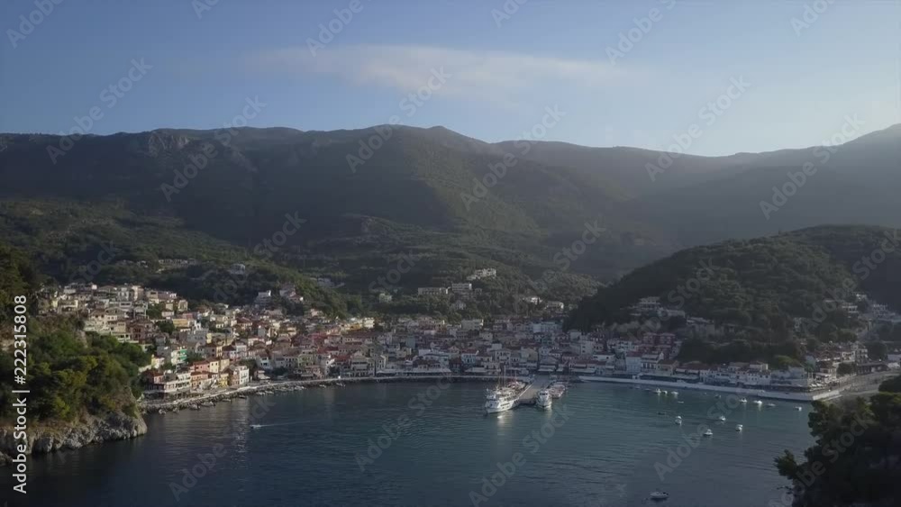Typical traditional greek village/homes by the sea from distance. Ionian sea Typical traditional greek village/homes by the sea from distance. Ionian sea