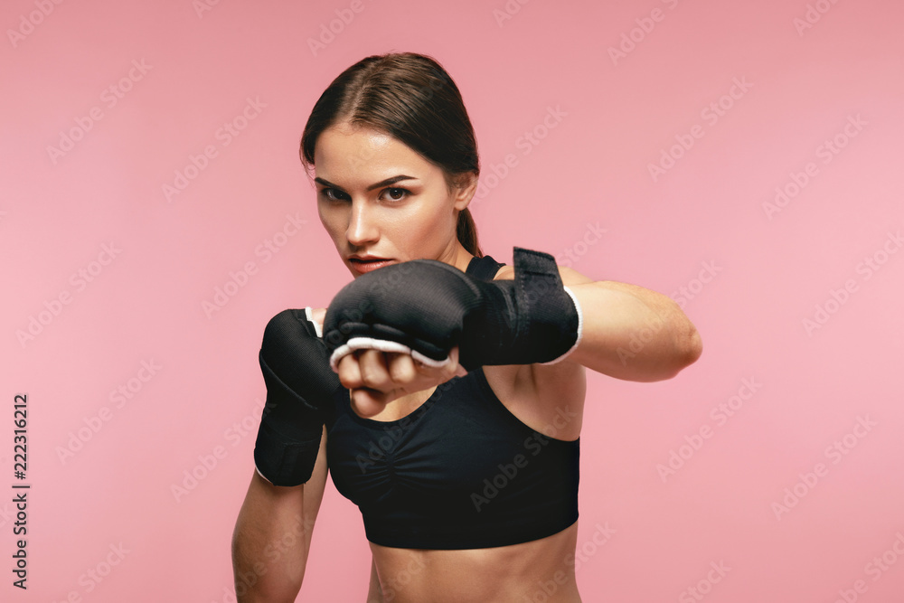Female Boxer. Sportswoman Training In Boxing Bandages Female Boxer. Sportswoman Training In Boxing Bandages