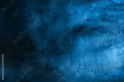 Blue winter watercolor ombre leaks and splashes texture on white watercolor paper background. Painted ice, frost and water.