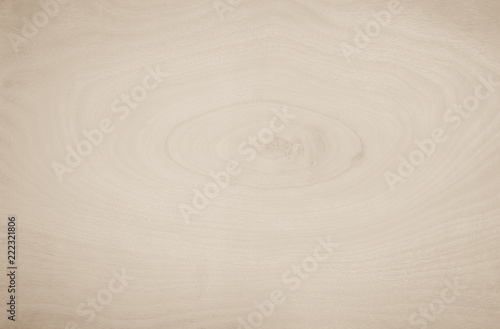 Old plywood textured wooden background or wood surface of the old brown at grunge dark grain wall texture of panel top view. Vintage teak surface board at desk texture with light pattern natural.. © Phokin