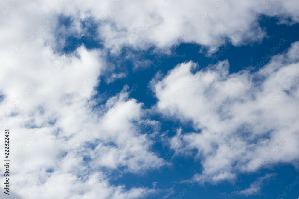 Fototapeta premium White fluffy clouds in the blue sky