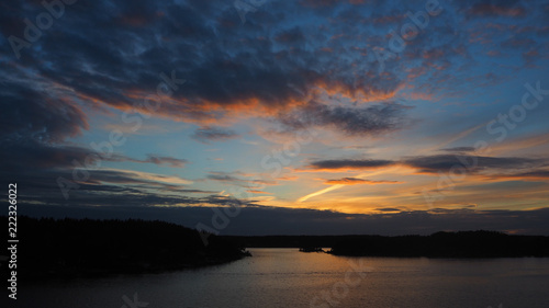 sunset at archipelago sea in sweden