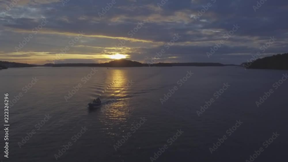 Revealing boat during sunset. Scandinavia thousand islands Revealing boat during sunset. Scandinavia thousand islands
