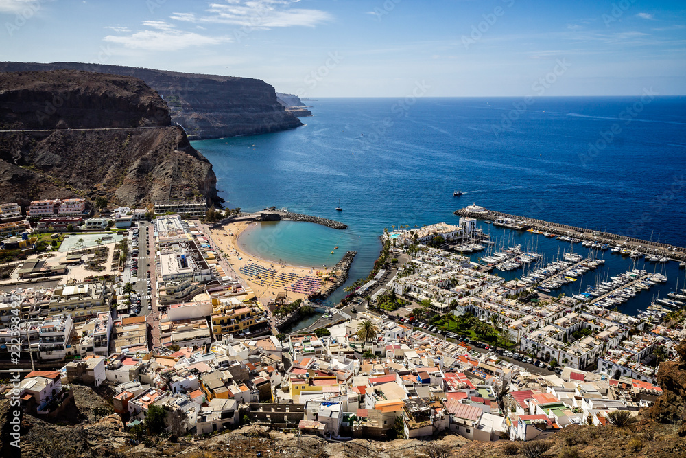 Aerial view of Puerto Mogan beach and marina from moutain top taken in Gran Canaria, Spain on 19 May 2013 Aerial view of Puerto Mogan beach and marina from moutain top taken in Gran Canaria, Spain on 19 May 2013