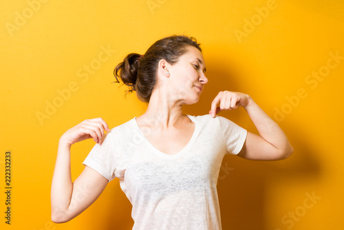 Bright brunette girl doing exercises