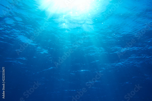 Sunbeams in the blue water © Alexstar