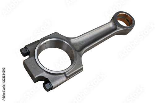 Connecting rod from a car engine. Isolated on white background