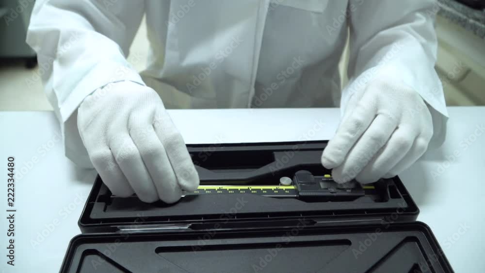 Scientist is using accurate Vernier Caliper equipment to measurement ...