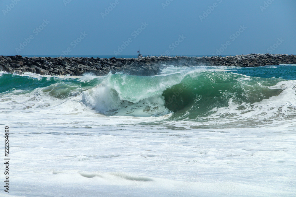 Large wave crashing at The Wedge in Newport Beach Large wave crashing at The Wedge in Newport Beach