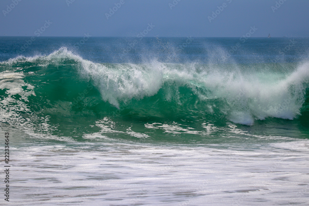 Large wave crashing at The Wedge in Newport Beach