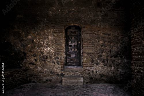 Photos Medieval narrow wooden door