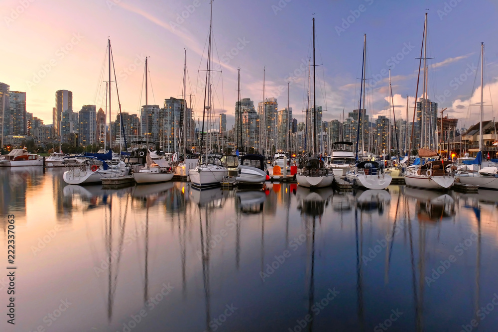Vancouver skyline at sunset. View of Yaletown and Heater Marina from Kitsilano. British Columbia. Canada.