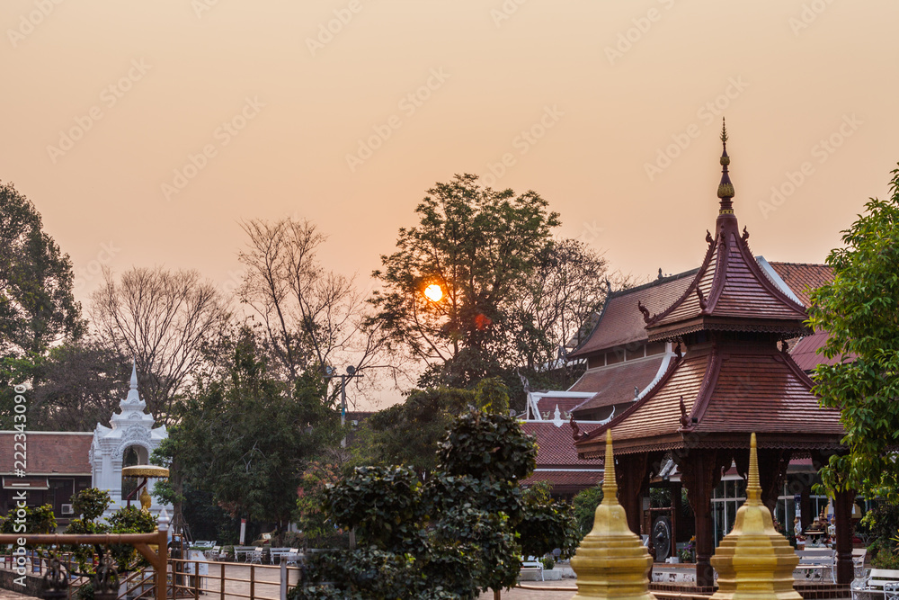 sunrise above pagodas at Wat Chedi Luang Chiang Mai. most important temples is the Wat Chedi Luang located in the ancient walled part of the city.