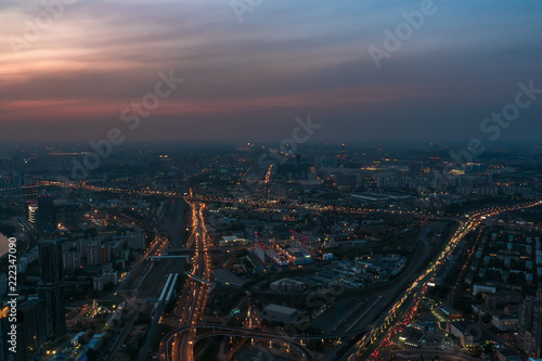 Aerial view panorama of night city Moscow  Russia. Urban cityscape after sunset with illuminated streets and building