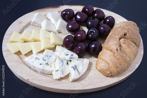 cheese plate on a dark background