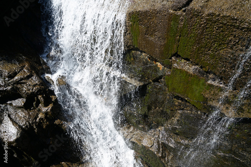 Waterfall at a pass road in Austria in early autumn   