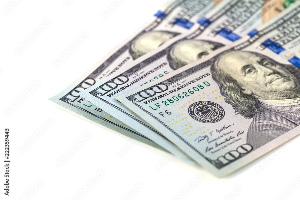 One hundred dollar bills, isolated on white One hundred dollar bills, isolated on white