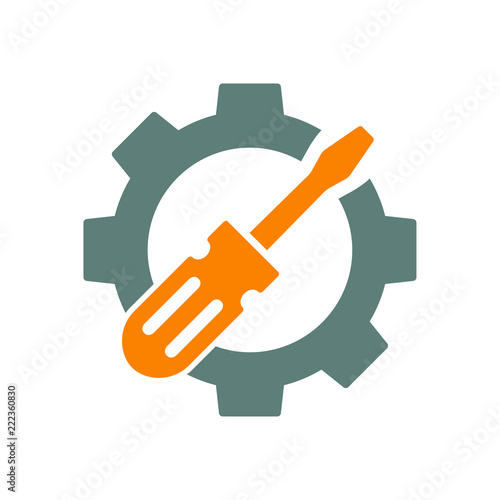 Icono plano destornillador en engranaje en gris y naranja