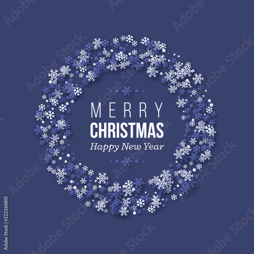 Christmas holiday wreath with paper cut style snowflakes. Dark blue background with greeting text, vector illustration.