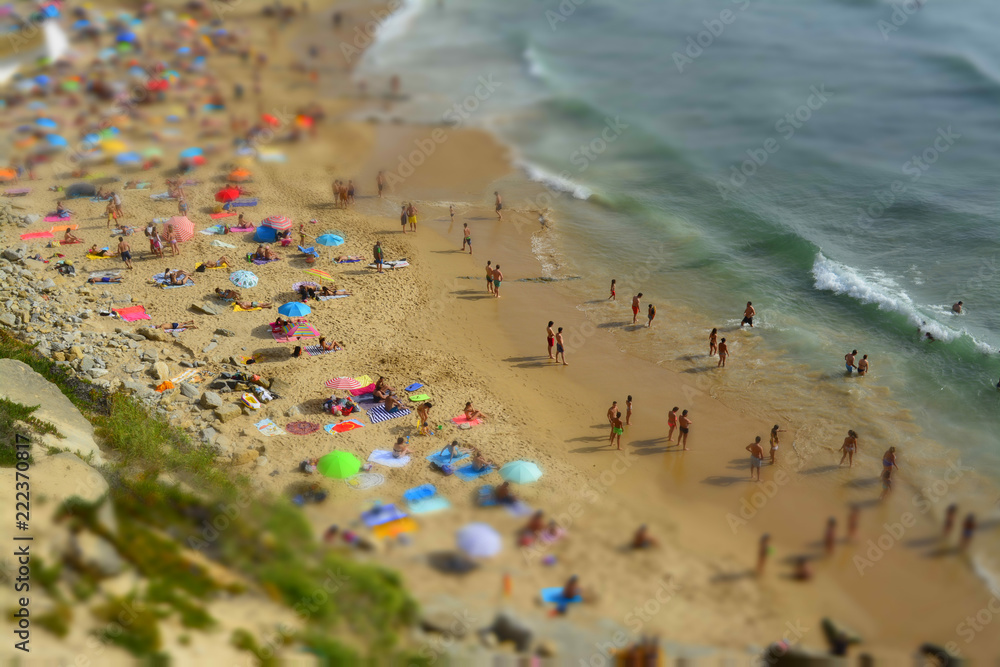 Aerial View Of People Relaxing On Beach In Portugal Aerial View Of People Relaxing On Beach In Portugal