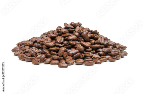 Pile of roasted coffee beans isolated in white background, selective focus on the center