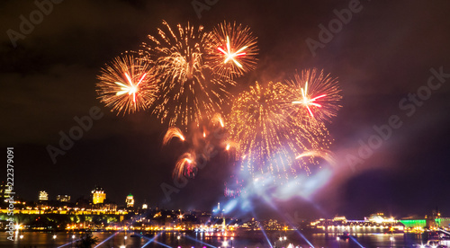 Gold/Orange fireworks during a summer festival in Quebec City, Canada.