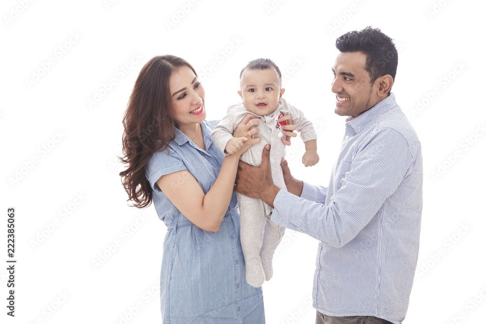 casual happy family playing with their cute son casual happy family playing with their cute son
