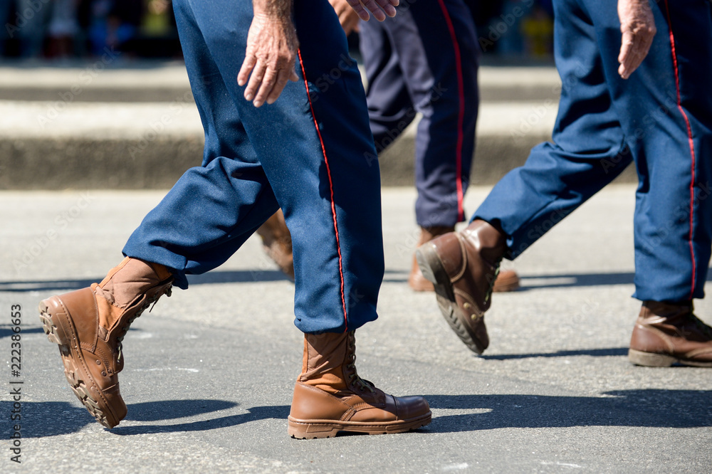 Obraz premium Military marching in a street. Legs and shoes in line