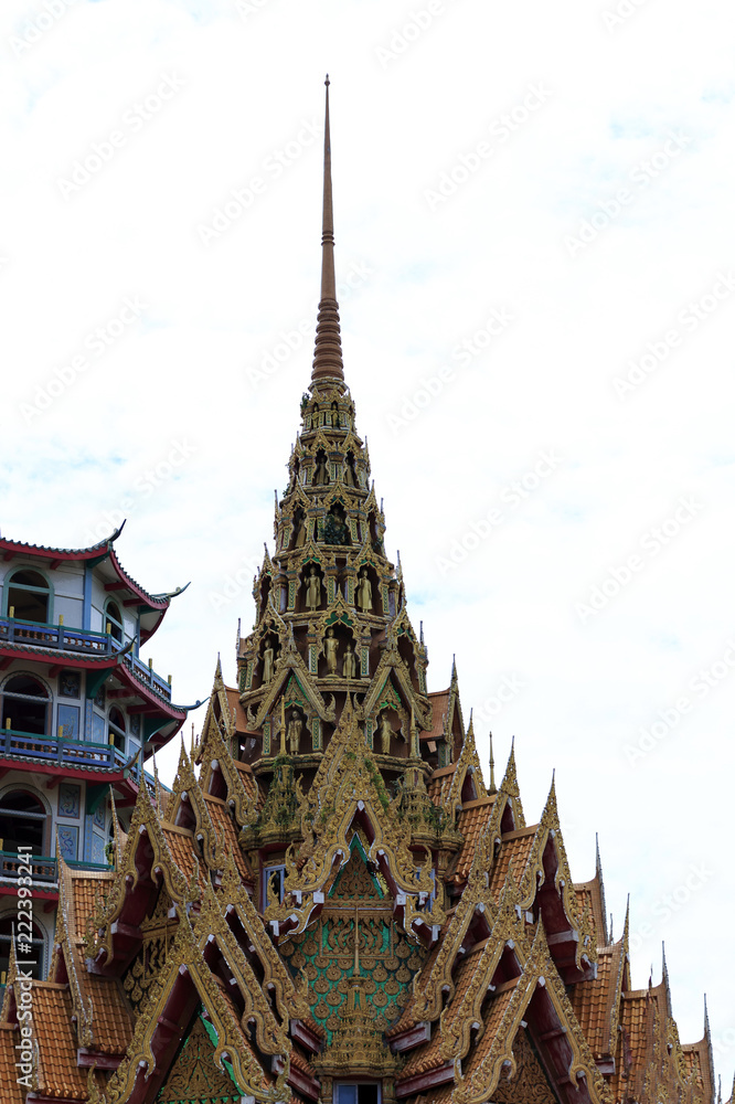 Fototapeta premium The pagoda with the temple roof in Thailand.