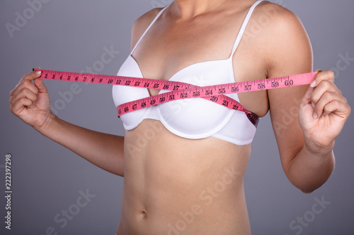 Woman Checking Her Breast Measurement